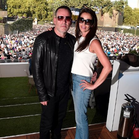 Tiffany in her white vest and Chris in his leather jacket